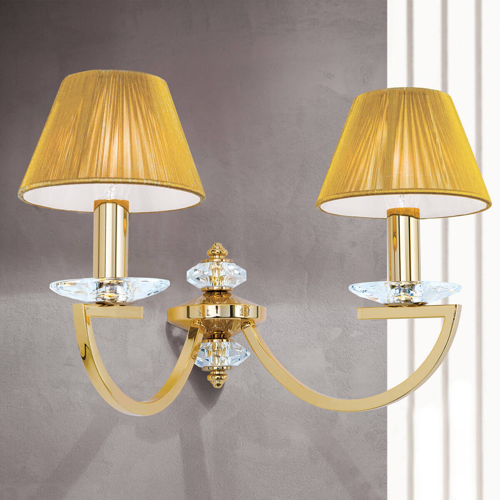 Vegglampe Avala med finish i ekte gull